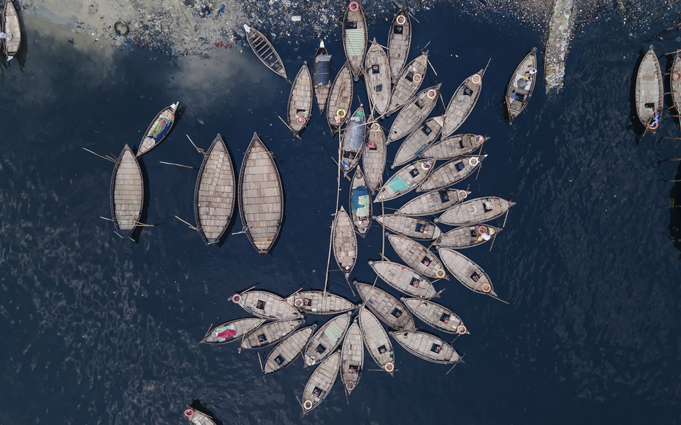 Aerial view of Wooden passenger boats along the Buriganga River, Sadarghat, Dhaka, Bangladesh - © Muhammadamdadphoto - stock.adobe.com